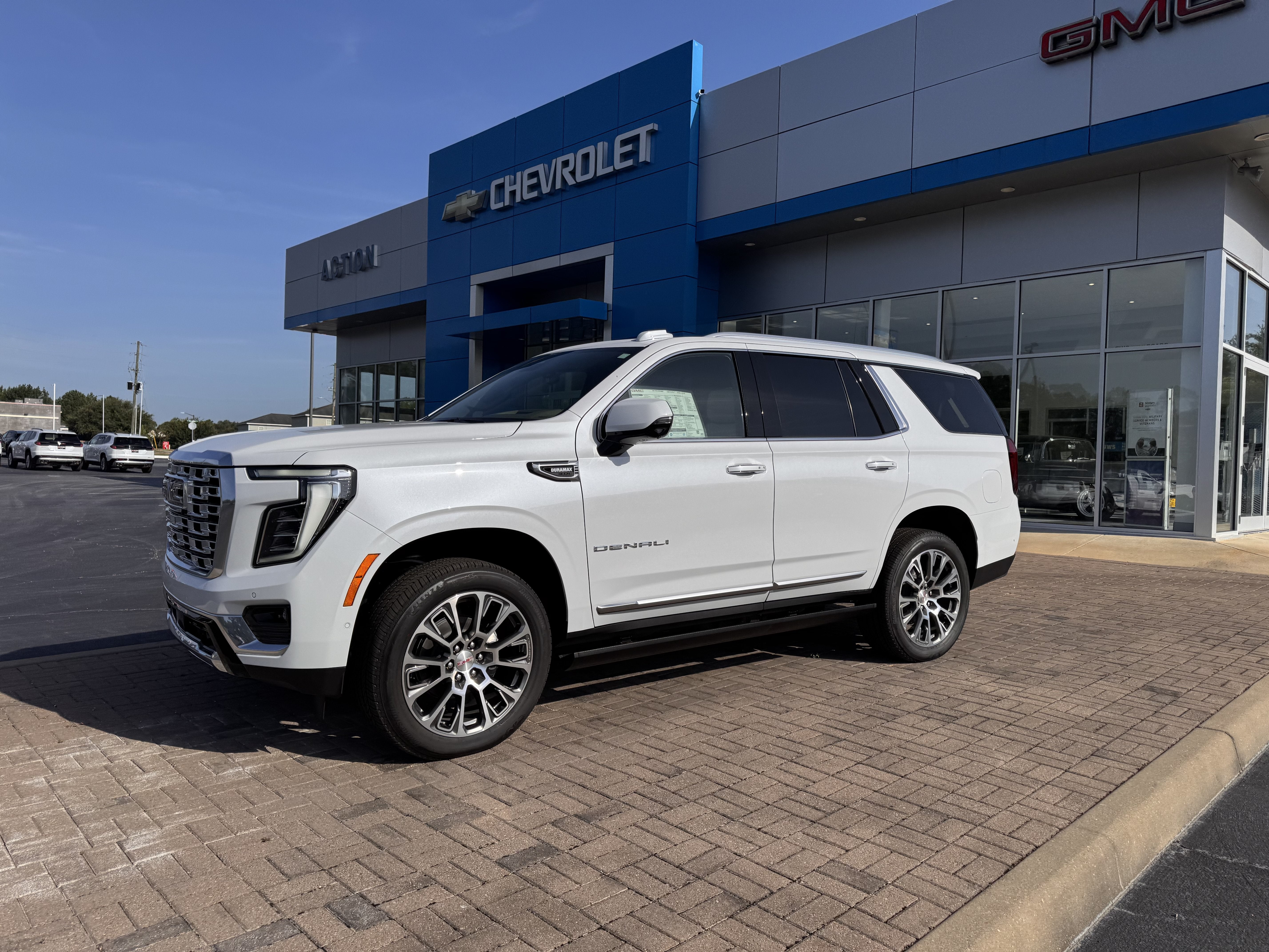 2026 GMC Yukon XL Denali in Glacier White Tricoat — front three-quarter view
