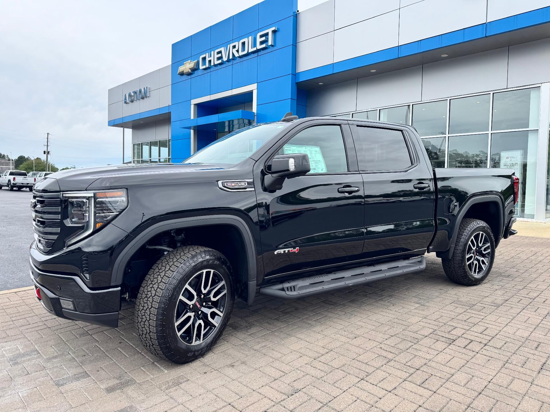 2026 GMC Sierra 1500 AT4 in Onyx Black — front three-quarter view