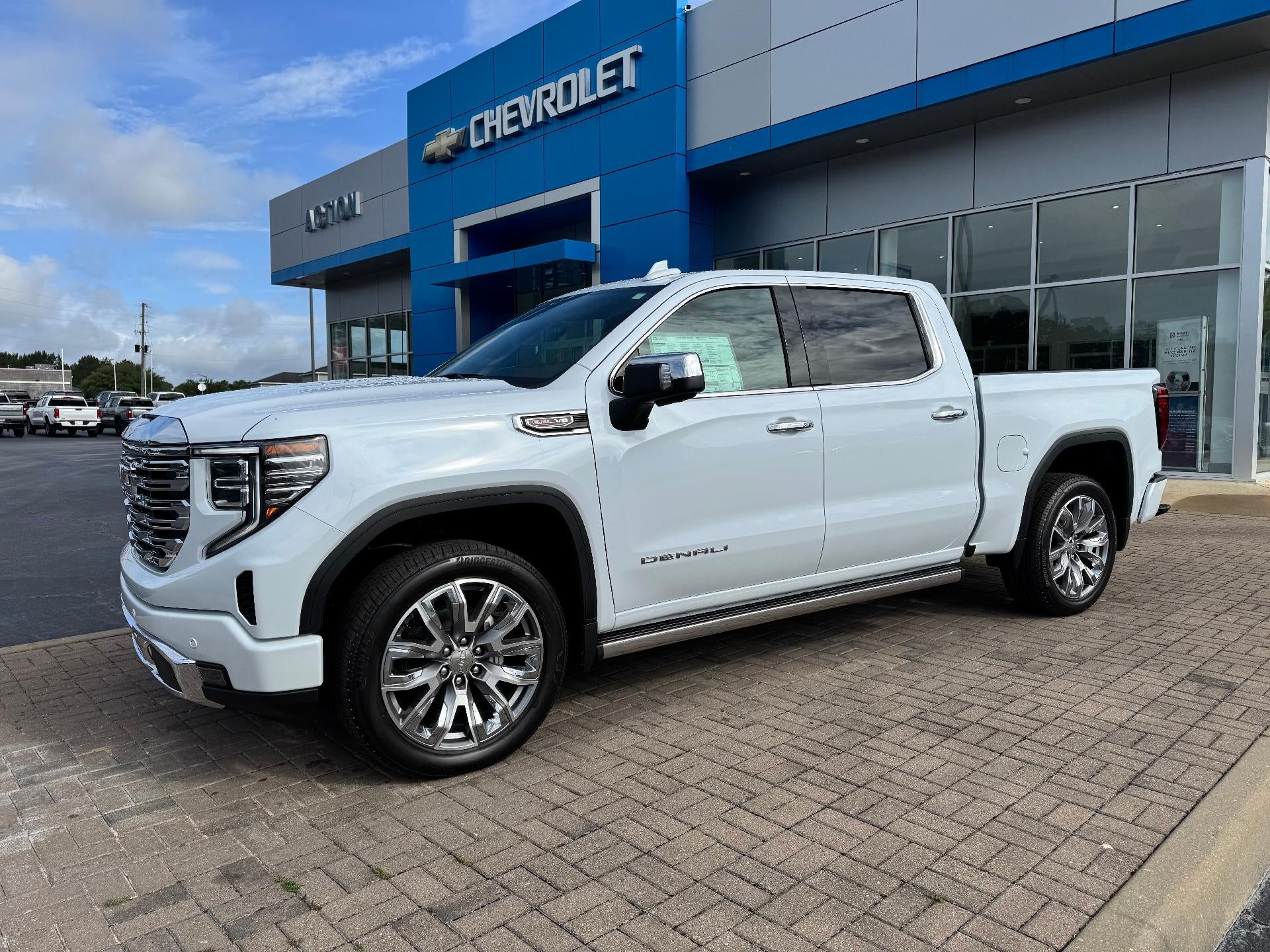 2026 GMC Sierra 1500 Denali in Glacier White Tricoat — front three-quarter view