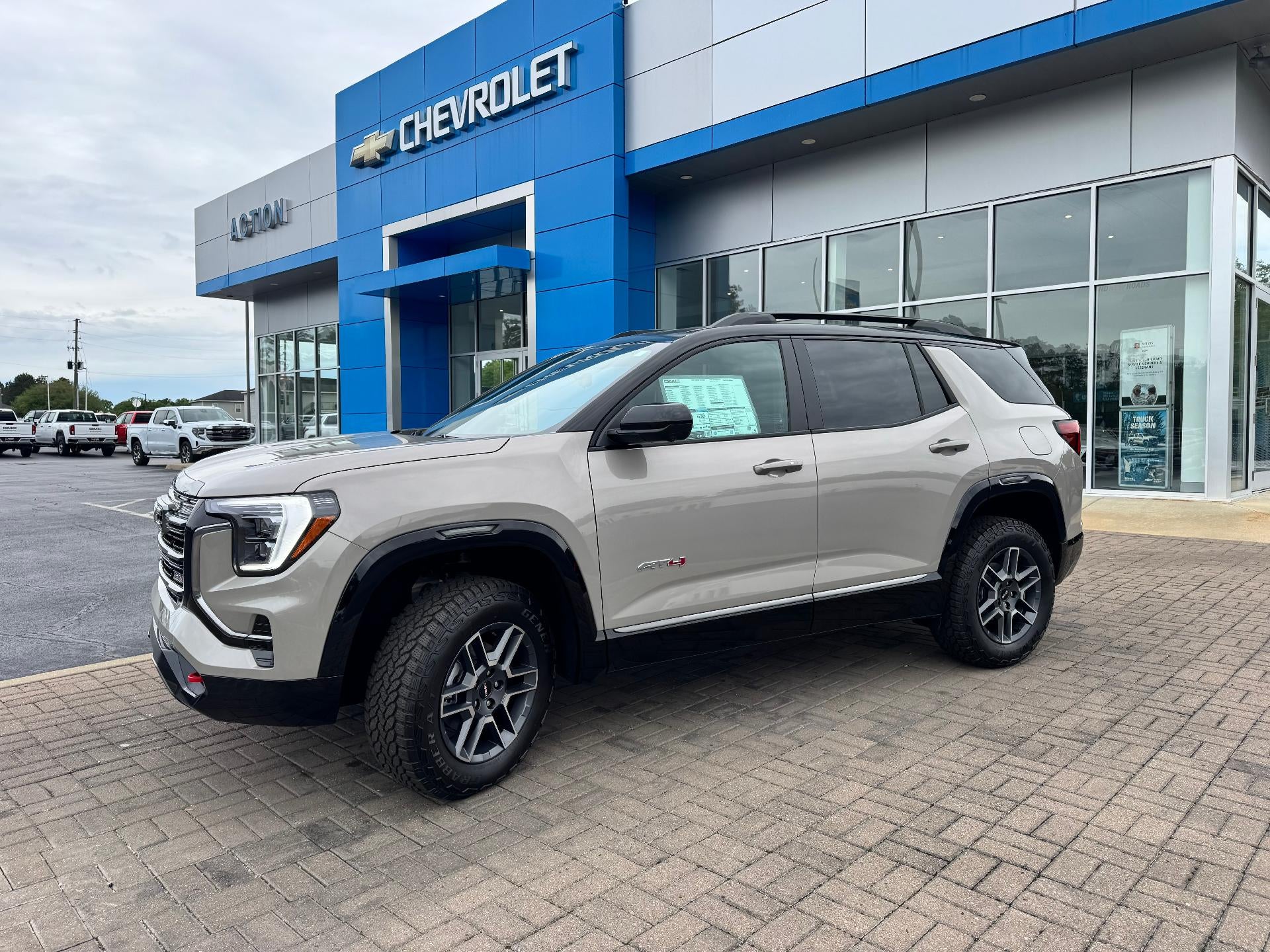 2026 GMC Terrain AT4 in Riverstone Metallic — front three-quarter view